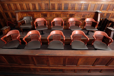 photo of a chairs in a jury box